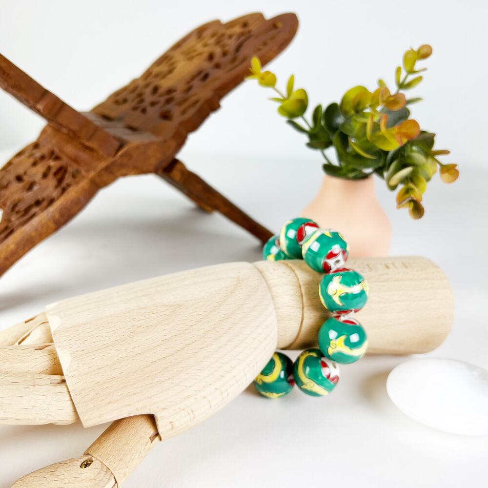 Ceramic painted beaded bracelet green floral design